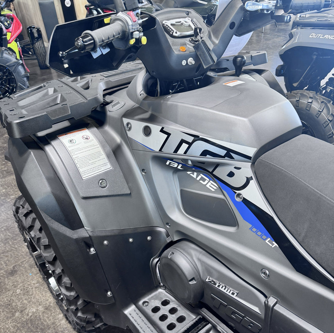 Brand new TGB ATV displayed at a dealership showroom ready for purchase